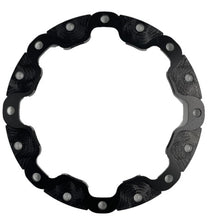 Load image into Gallery viewer, A black anodized rotor adapter on a white background