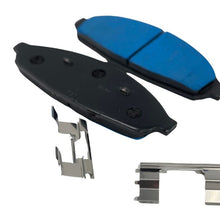 Load image into Gallery viewer, 2 Crown Vic brake pads with 1 of them blue in color
