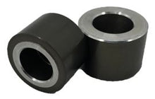 Load image into Gallery viewer, Two brake caliper pistons on a white background
