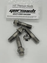 Load image into Gallery viewer, Four titanium studs and nuts on a plain white background with packaging
